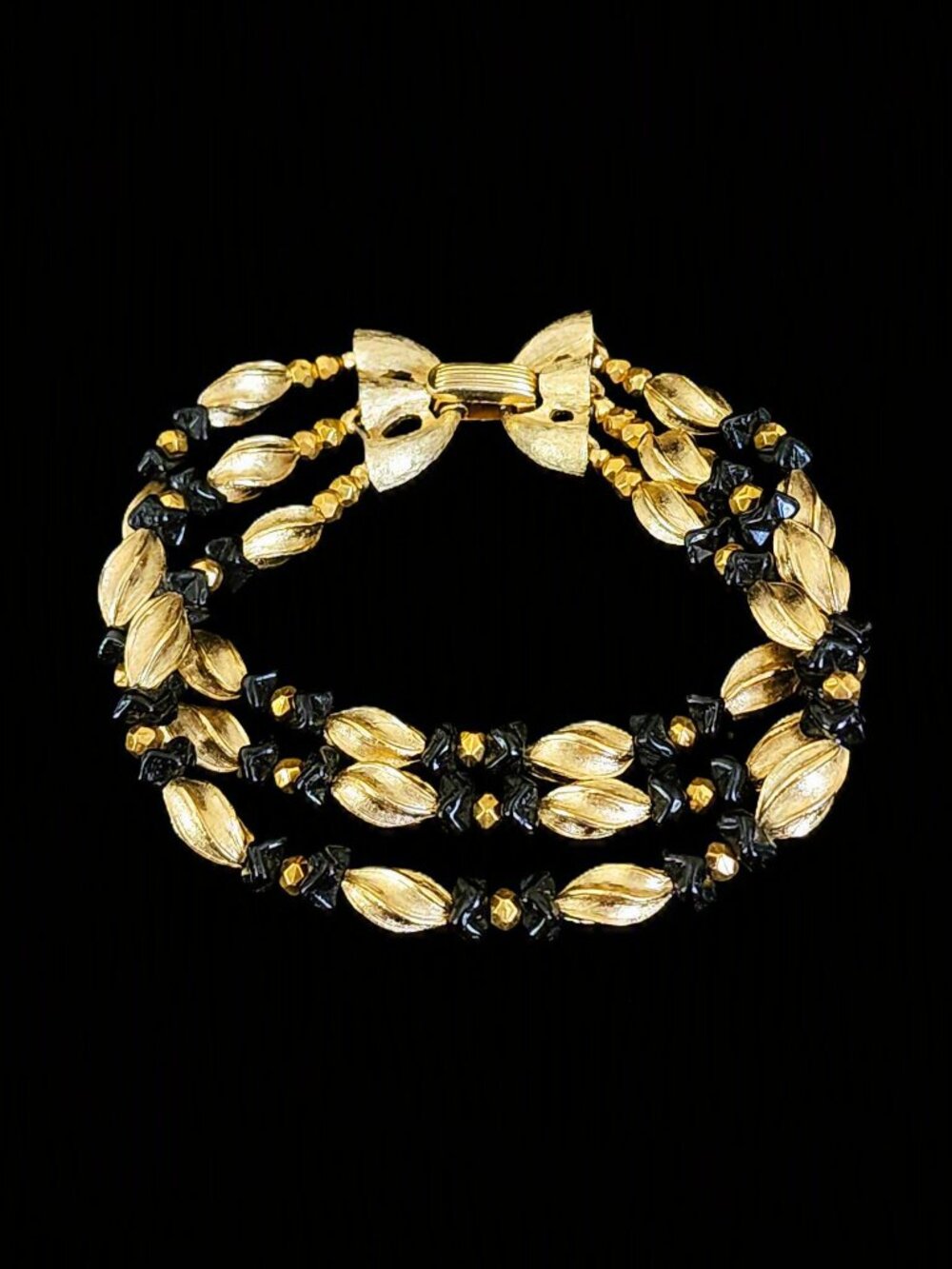Vintage 1950s Crown Trifari Black Glass Gold Tone 3 Strand Bow Bracelet 7"